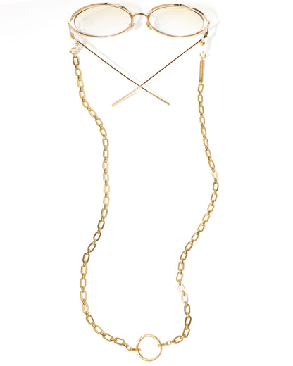 Gold metal eyeglasses with a long chain strap and a circular ring detail at the bottom, displayed on a clean white background.