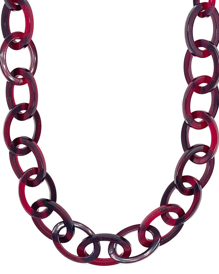 Red chain necklace on a white background